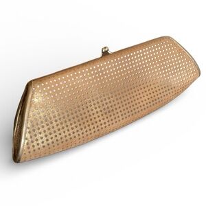 RODO metallic gold clutch, laser cut suede over satin, “kiss” lock.
